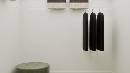 (Rendering, actual home's finishes will vary.) Built-in shelving maximizes the walk-in closet and helps organize growing wardrobes