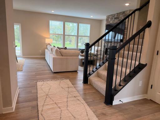 The welcoming entryway sets the tone for the home with clean lines, natural light, and inviting finishes.
