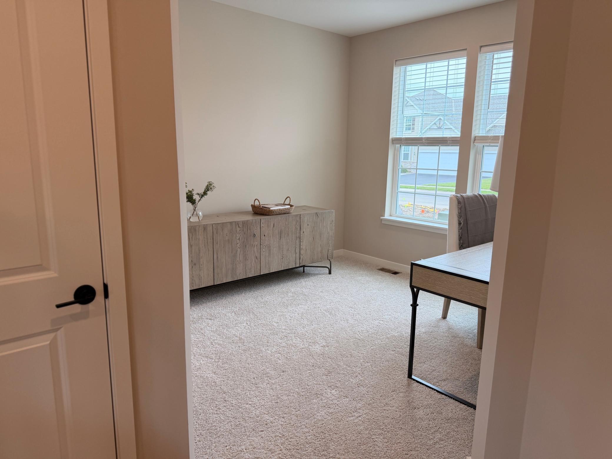 Spacious and sunlit flex room ready for your personal touch—ideal for a home office, studio, playroom, or guest accommodations