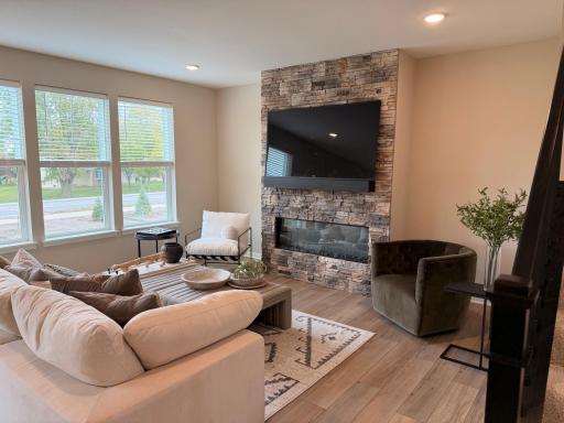 Inviting fireplace serves as a warm focal point, perfect for relaxing evenings and adding character to your home.