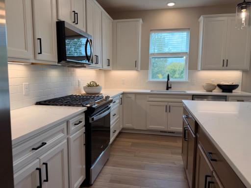 Equipped with stainless steel appliances and contemporary fixtures that combine style and efficiency.
