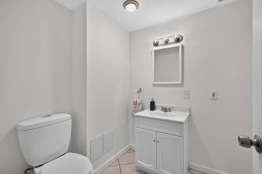 The lower level bathroom is freshly painted!