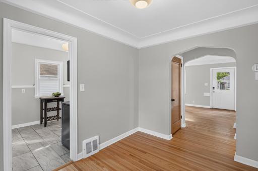 The door in the hallway leads to the upper level bedroom