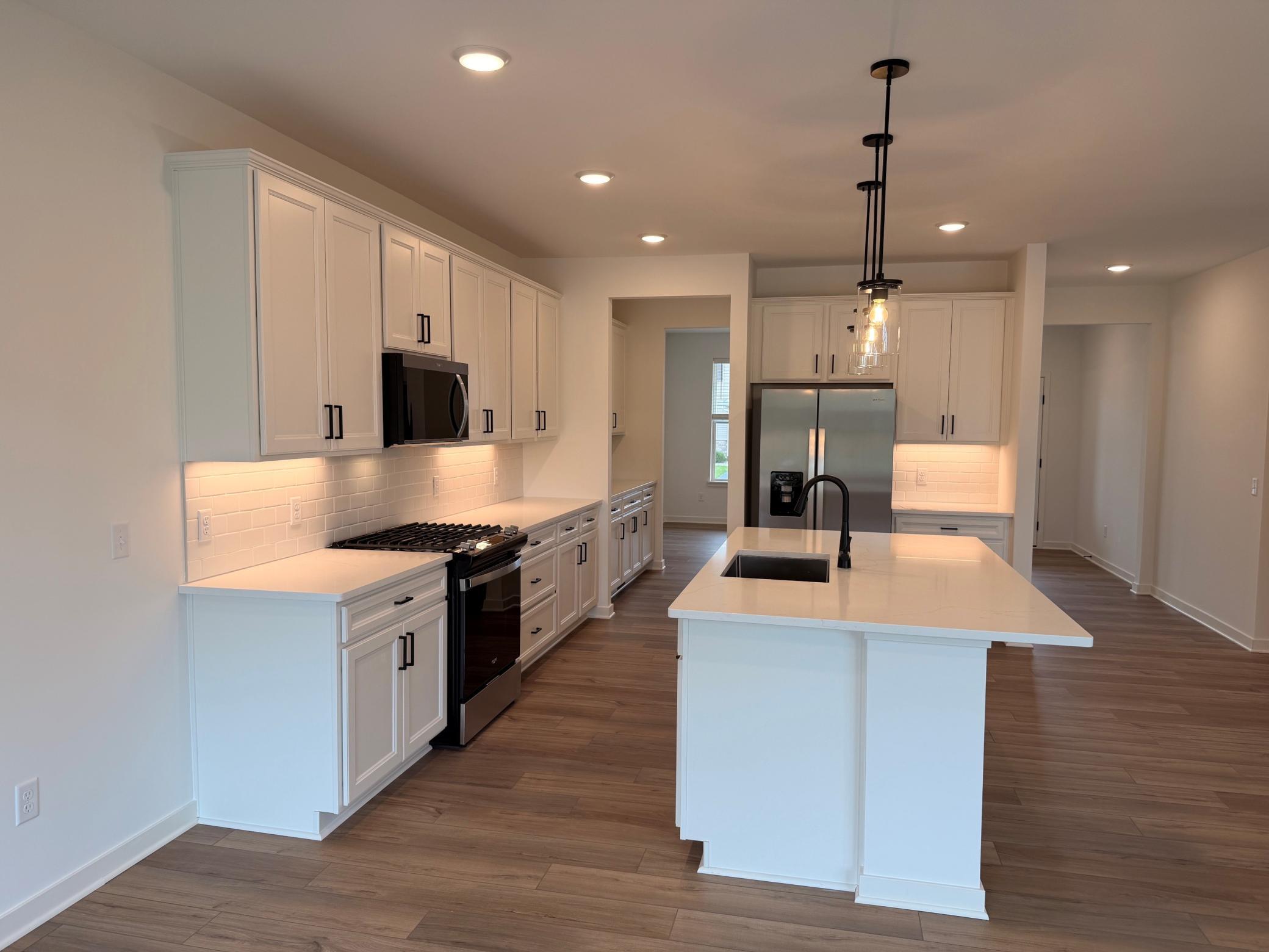 Equipped with stainless steel appliances and contemporary fixtures that combine style and efficiency.