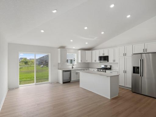In a shared open layout with the kitchen, homeowners can effortlessly serve piping hot meals straight out of the oven and onto the dining table.