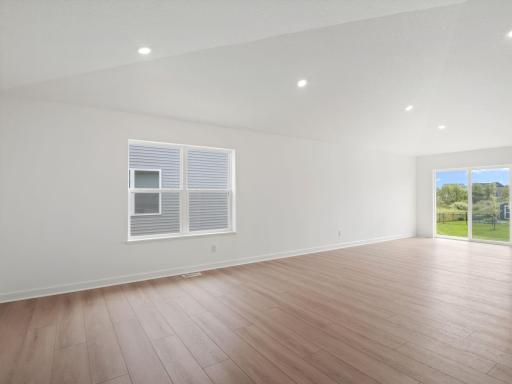 Airy and inviting, the Great Room features an elegant vaulted ceiling and is the perfect place to watch movies, read and relax with loved ones.