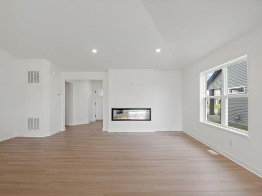 With ample space for comfortable furnishings, this central gathering area is where everybody can unwind together after a busy day