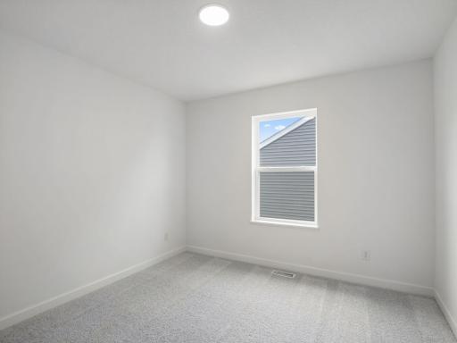 Two secondary bedrooms are nestled in a private corner away from the main living areas, perfect for offering a peaceful retreat after a busy day.