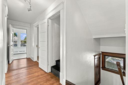 Hallway on the 2nd level provides access to 4 bedrooms, full bathroom and stairway to the third level.