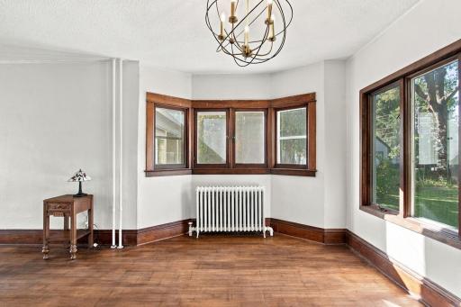 Dining room with beautiful hardwood floors.