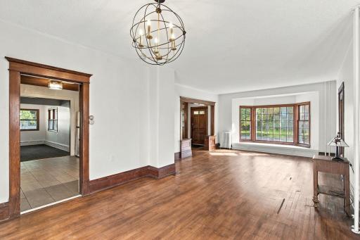 View from the dining room with a peak into the kitchen and family room.