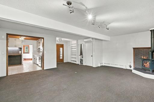 Located right off the family room is a 1/2 bathroom, laundry room and access to the 2 stall garage.