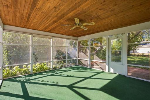 3 season screened in porch located right off the living room with mature landscaping ready for you to enjoy!
