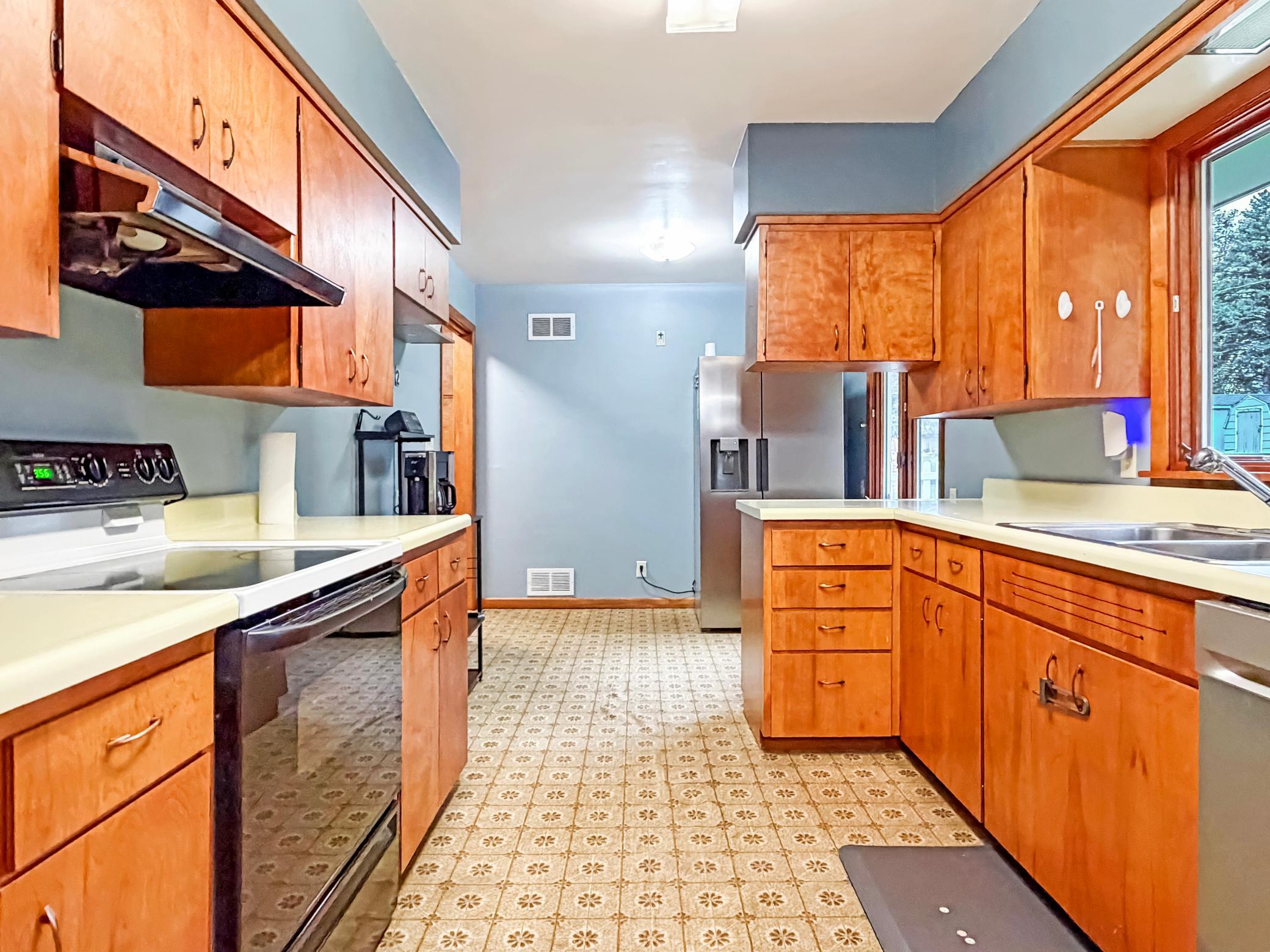 Kitchen directly off of dining room