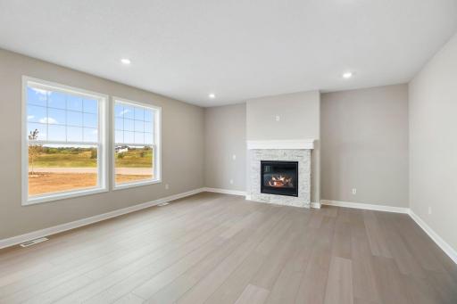 The Great Room features large windows for ample natural light and is the perfect place for gathering with friends and family.