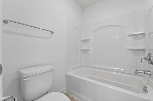 (Photo of a similar home, actual homes finished will vary) The tub/shower combo in the Jack and Jill bath.