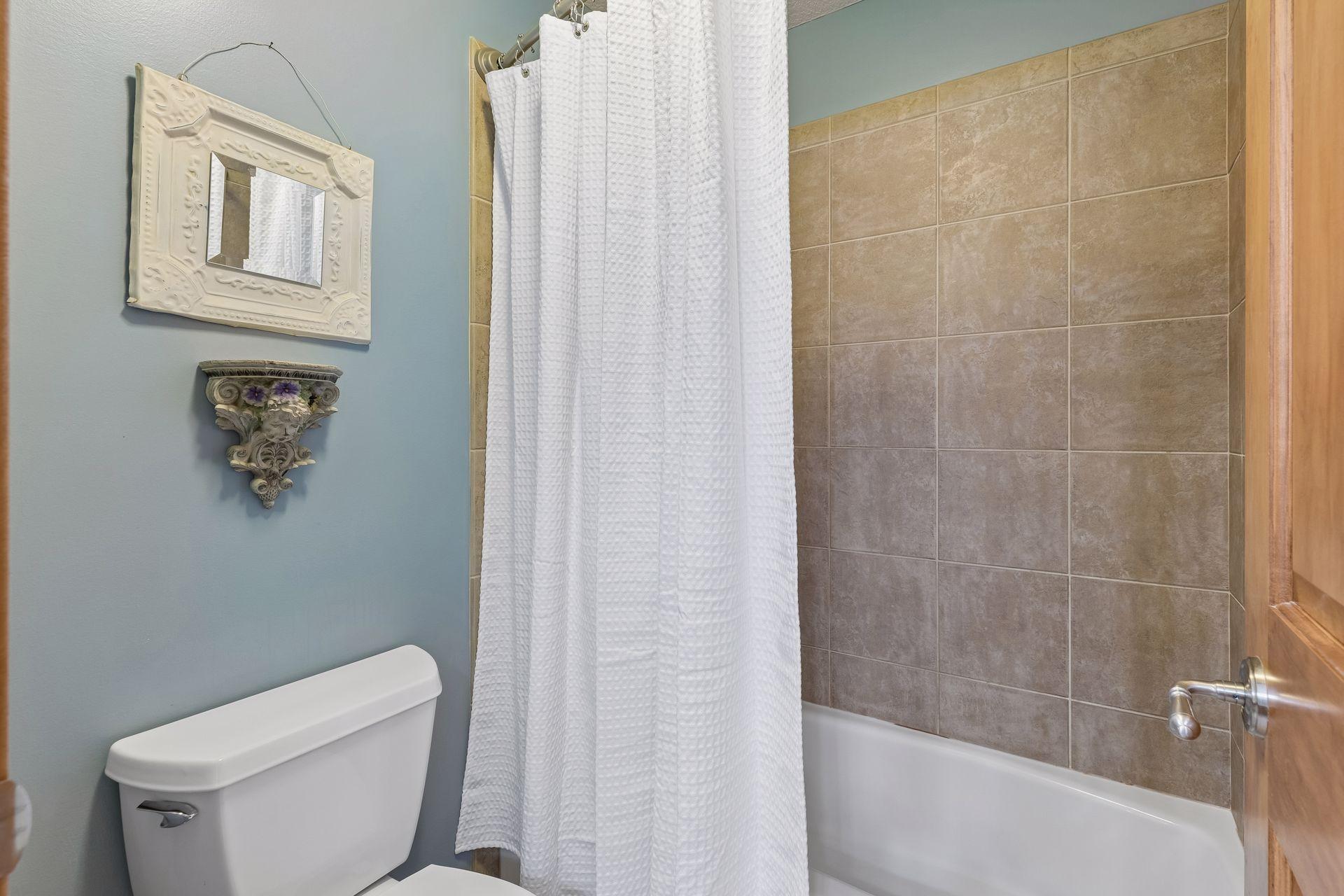 Separate area of tub, toilet