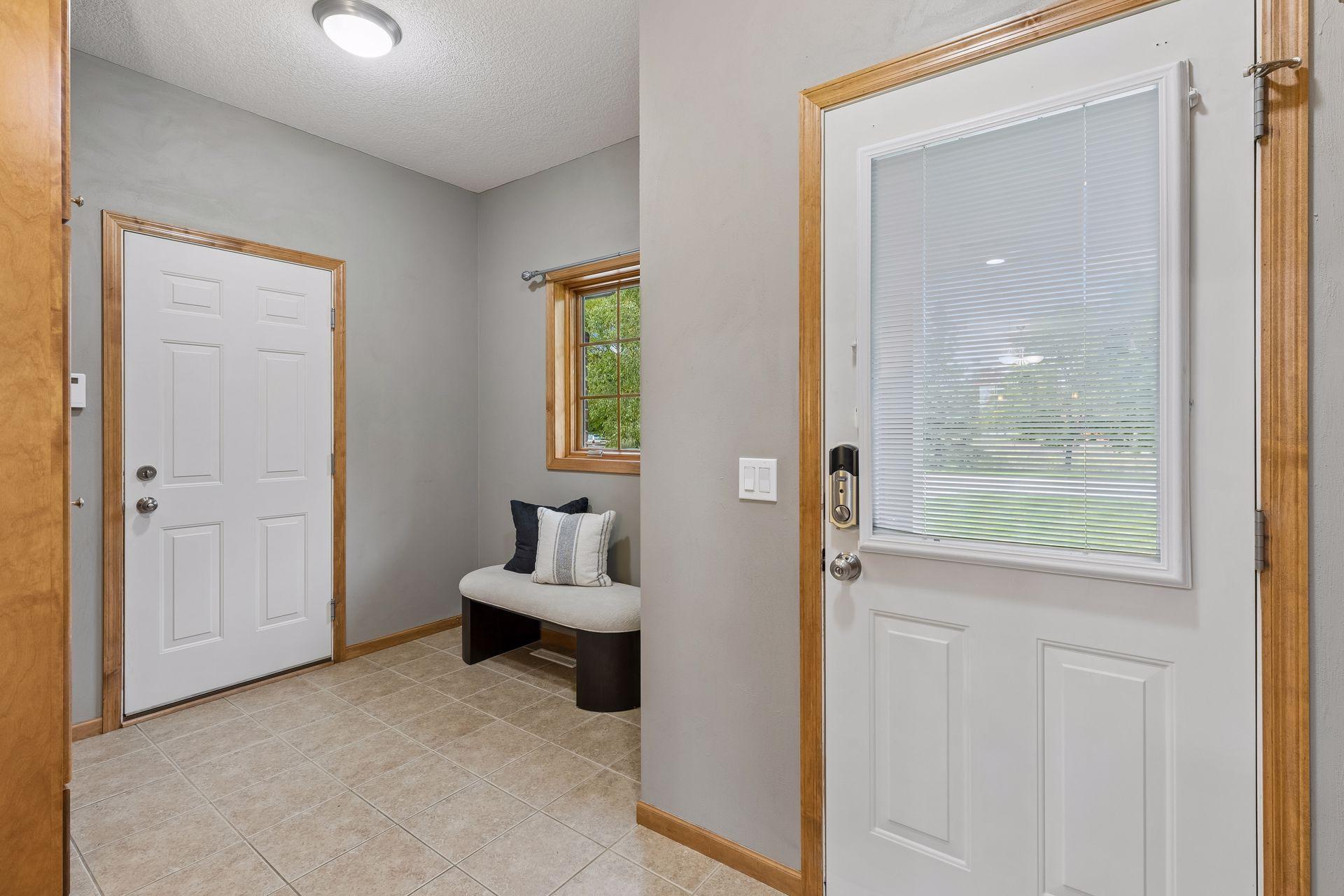 Mud room spacious with Finished garage Epoxy