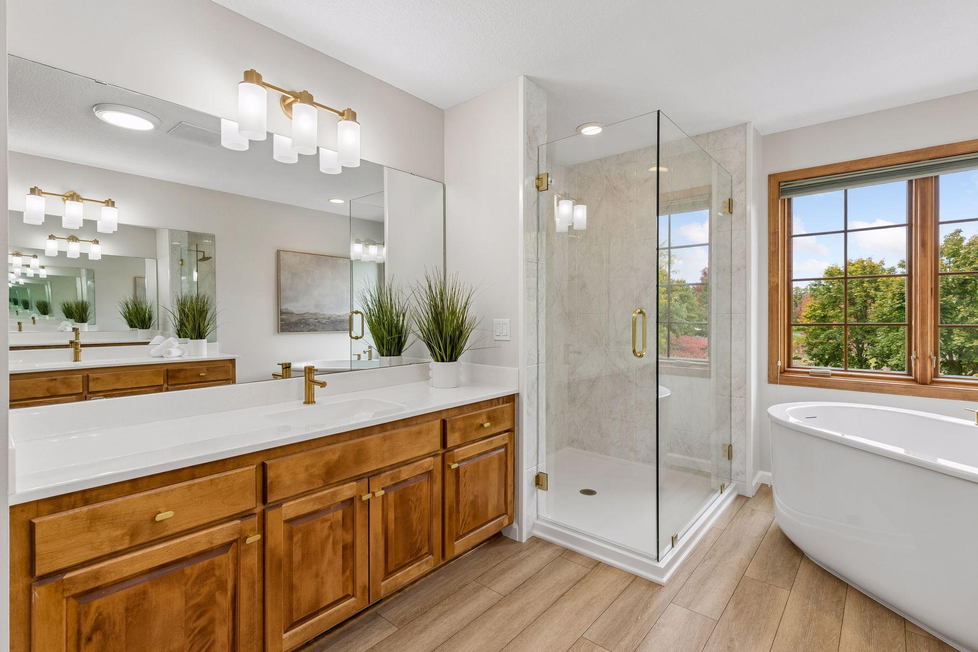 New tub, large dbl vanities, tile shower