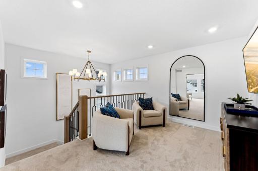 A versatile loft sits at the top of the stairs to provide a shared living space that everyone can enjoy.