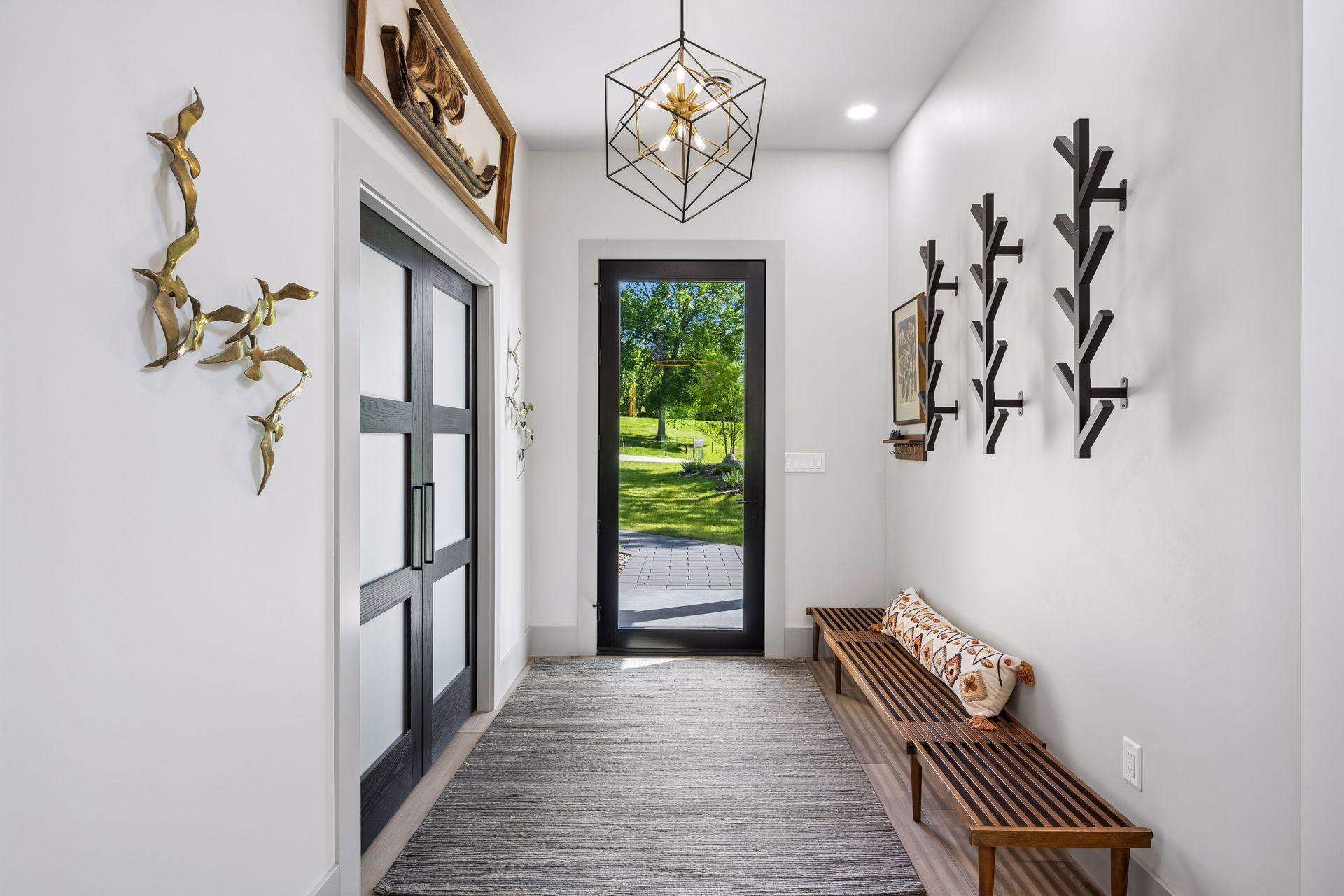 10-foot hight ceilings welcome you into a thoughtfully crafted Scandinavian-inspired modern home, blending sophisticated architecture with comfortable lake living.