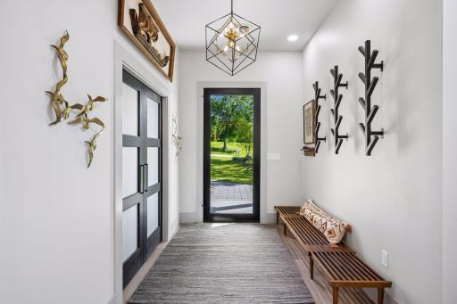 10-foot hight ceilings welcome you into a thoughtfully crafted Scandinavian-inspired modern home, blending sophisticated architecture with comfortable lake living.