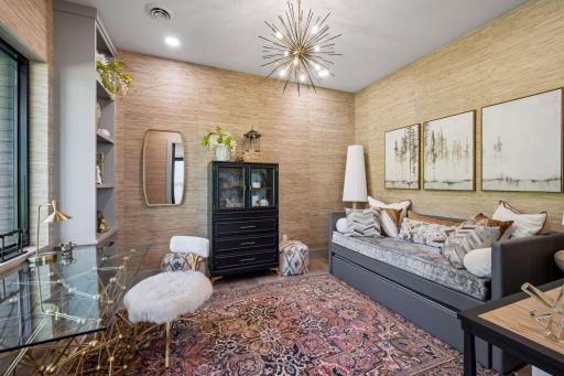 This versatile office provides a quiet and comfortable space for working from home or reading. With its generous size and flexible layout, it could easily serve as an additional bedroom.