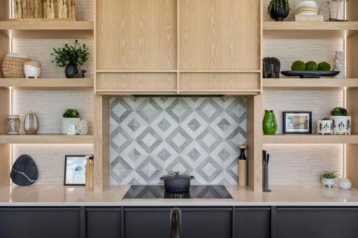 For those who prefer cooking with gas, the fantastic kitchen has been thoughtfully designed to allow for an easy conversion from the induction cooktop.