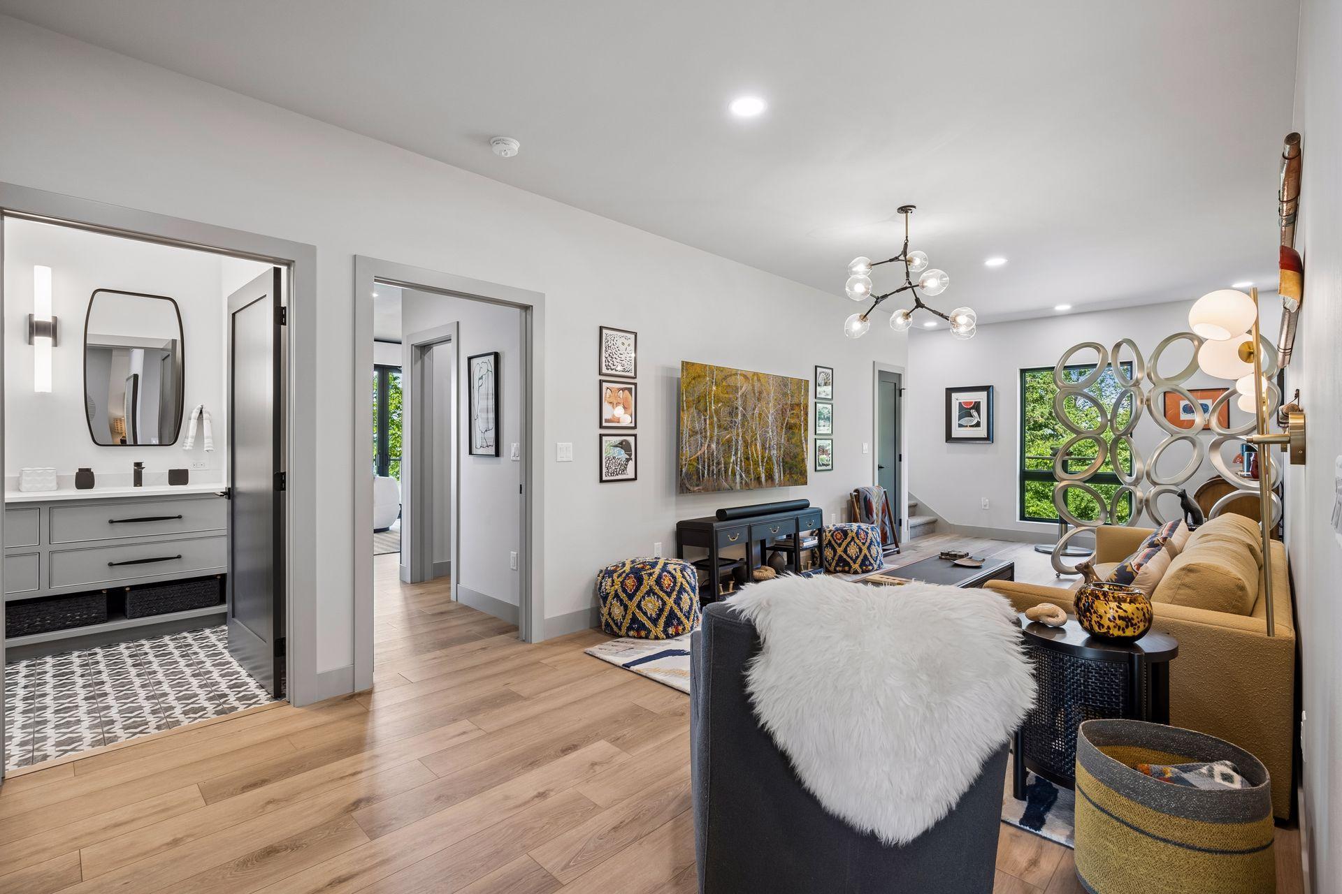 The upper level family room is centrally located between the bedrooms, this versatile retreat provides additional living space while maintaining the home's bright, open feel.