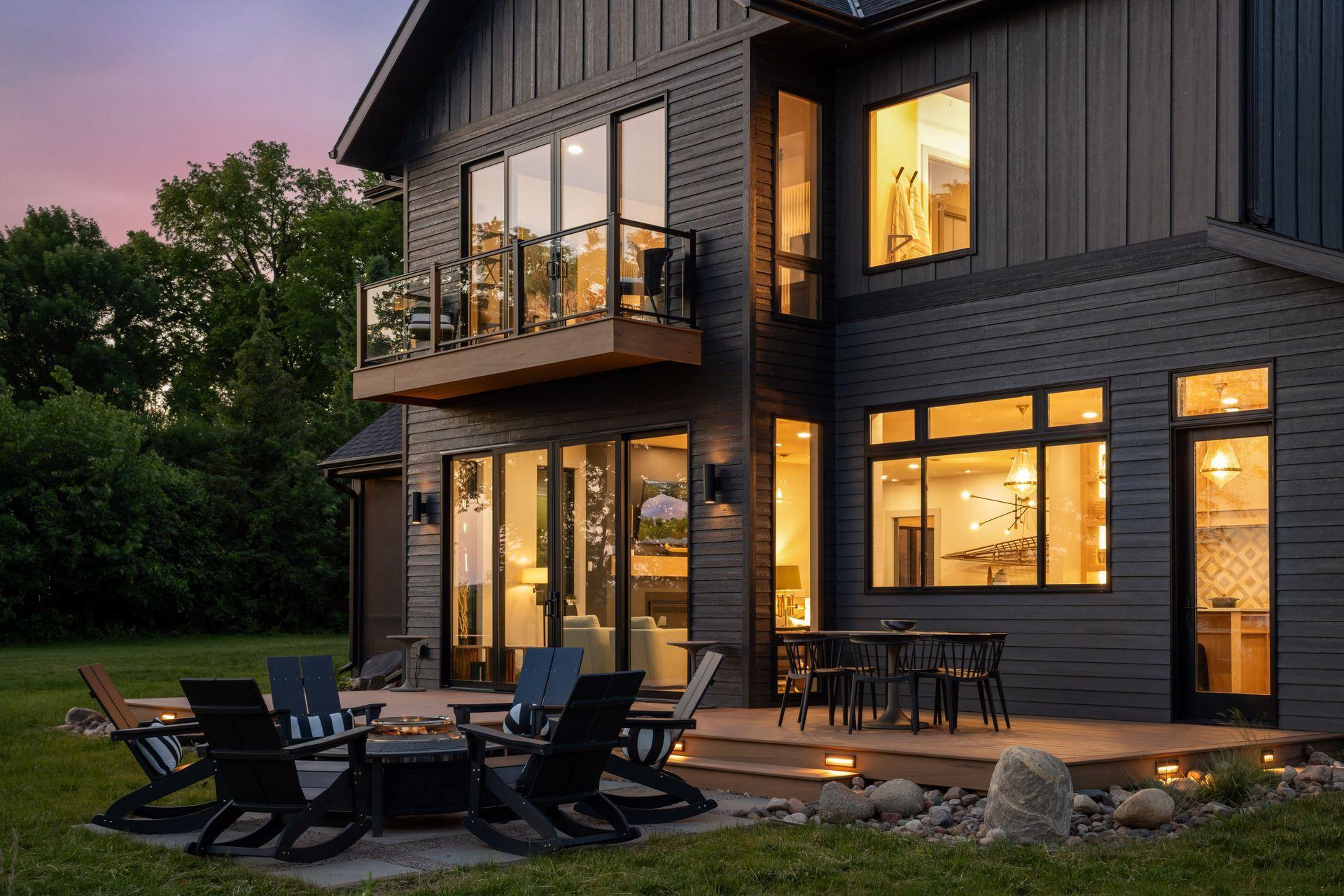 Step outside to a beautifully designed lakeside patio where a solo fire pit creates the perfect gathering place for evening conversations under the stars.