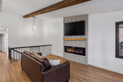 Updated fireplace (TV added with virtual staging)