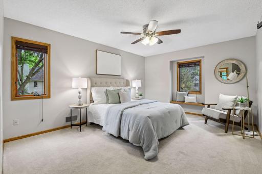 Upstairs, the primary bedroom suite offers a private retreat with an ensuite bathroom.