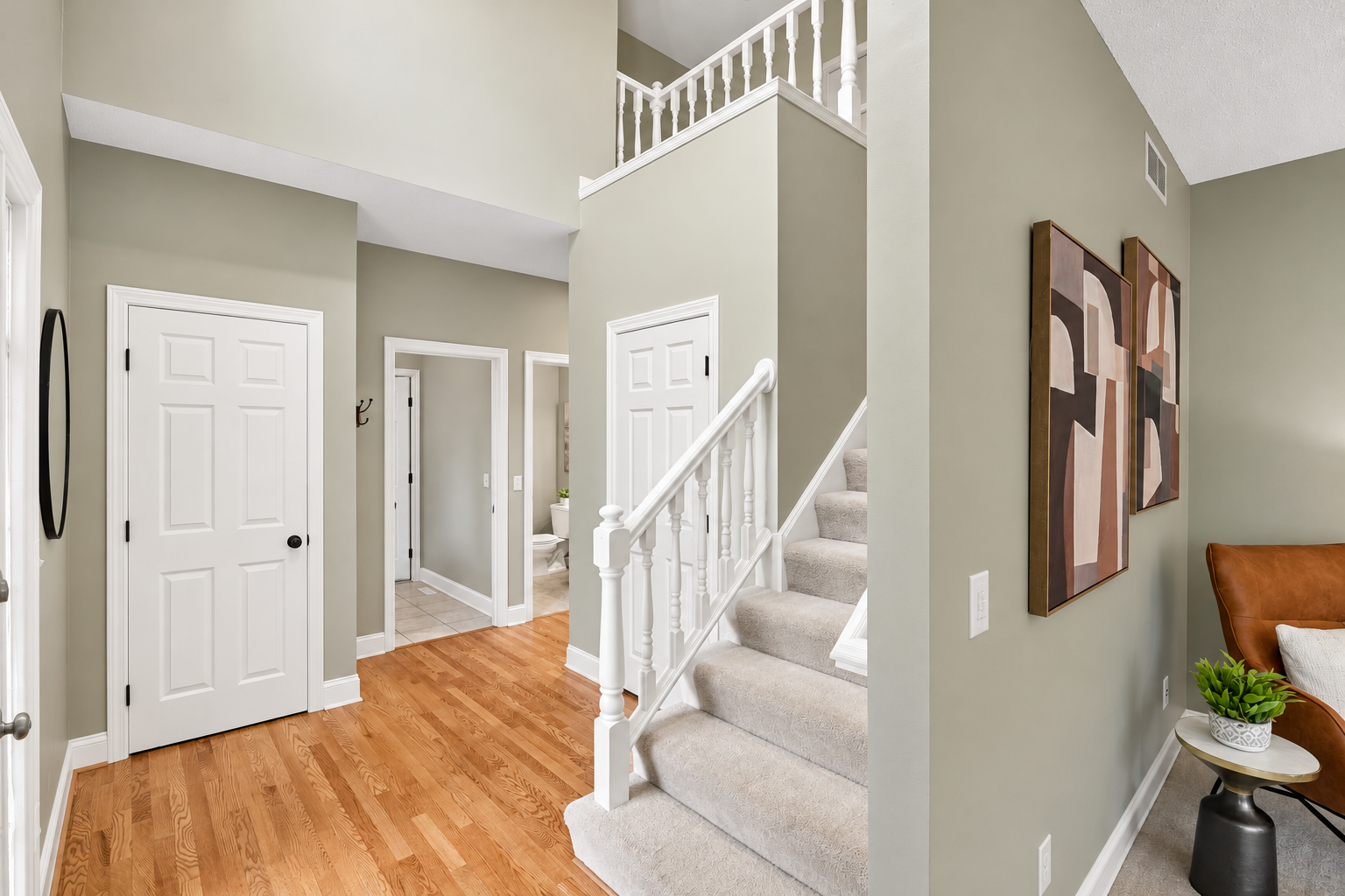 Photo has been digitally enhanced to illustrate how the kitchen could look with white enameled cabinetry.
