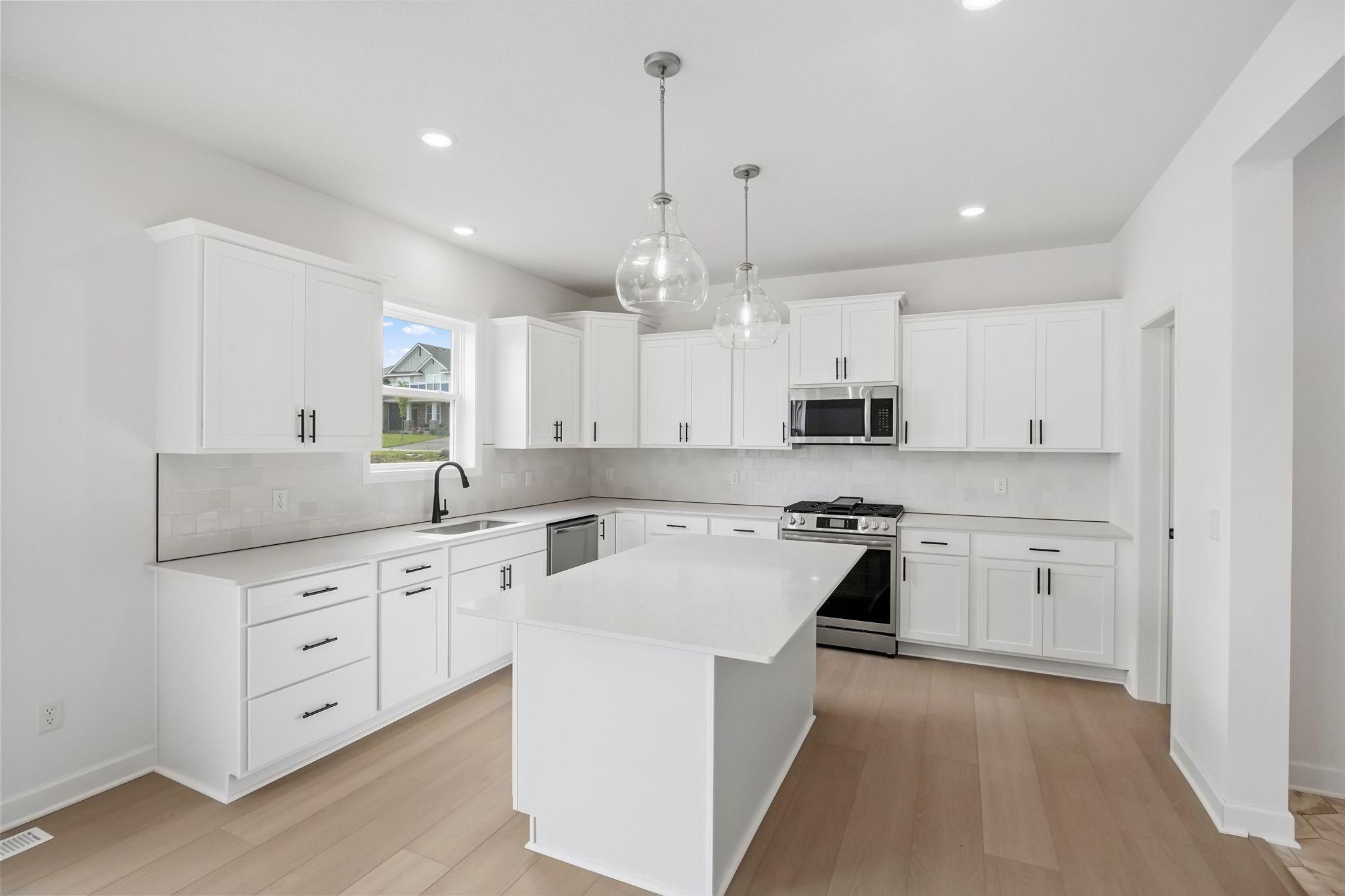 (All the following photos are of a similar home, actual finishes may vary.)
