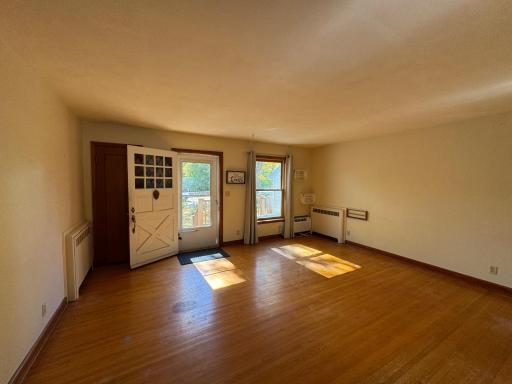 Spacious Living Room with Hardwood Floors