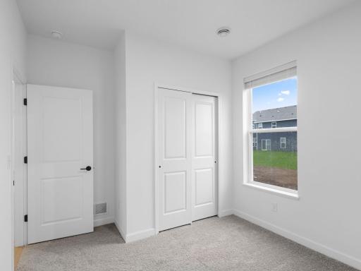 Residing in a quiet corner, this first-floor bedroom is perfect for hosting overnight guests or visiting relatives.