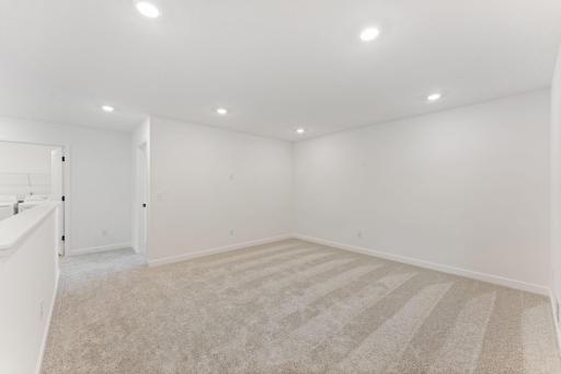 Customize the loft with an accent wall and plush furnishings