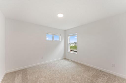 All the bedrooms in the home include a generously sized closet for wardrobe storage and wall-to-wall carpeting.