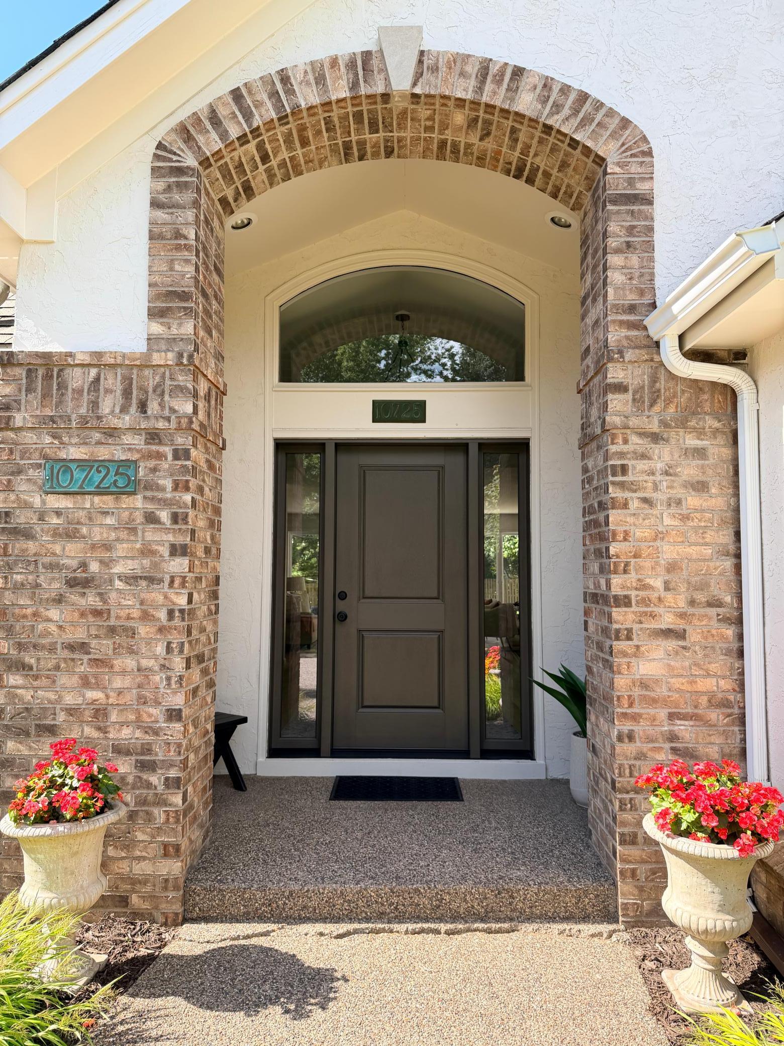 The grand, recessed entry shelters the front door from the elements, provides a great place for packages, and lets ample light into the foyer.