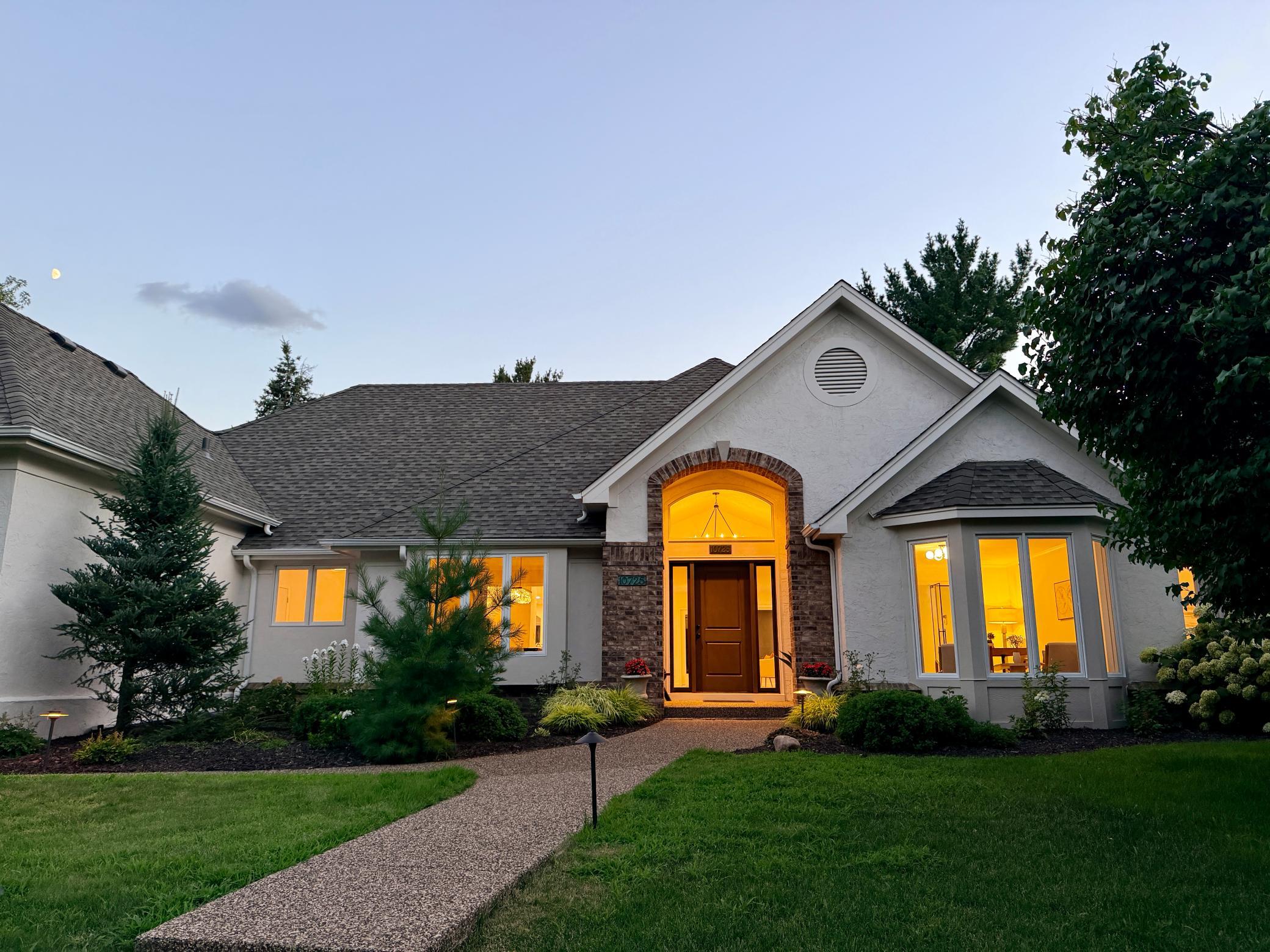 10725 Purdey Road is a sprawling, one story, destination home that exudes curb appeal with a grand entry, brand new roof, fresh exterior paint, mature landscaping with accent lighting and a sprinkler system, and a side-load garage off the cul-de-sac.