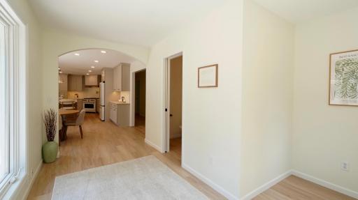 The large kitchen opens into the sun room.