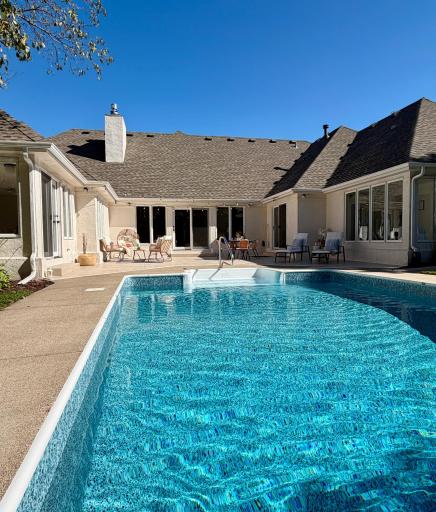 The renovated pool was just renovated with a brand new 27 mil liner and a brand new filtration system. The far end is nine feet deep and may have previously had a diving board.