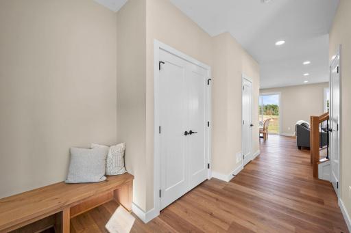 Imagine walking into the front entry of your new home with a nice bench seat and closet flowing into an open concept of living room, dining room and kitchen