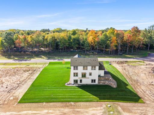 Grass to side property lines and 30feet from house