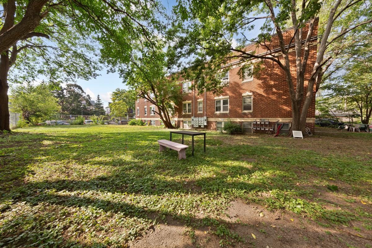 Fenced in, Adjacent lot provides a welcoming place to relax and entertain.