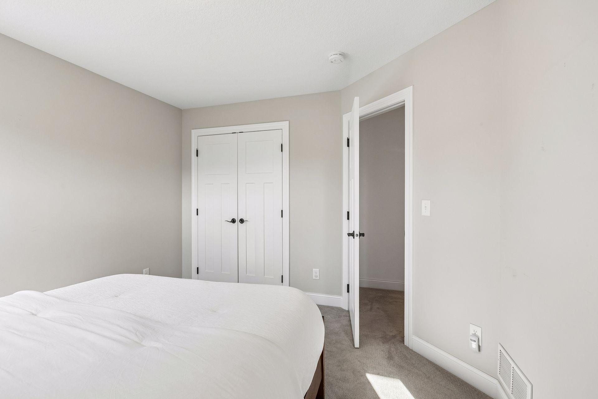 Beautifully appointed bedroom offers a comfortable retreat.