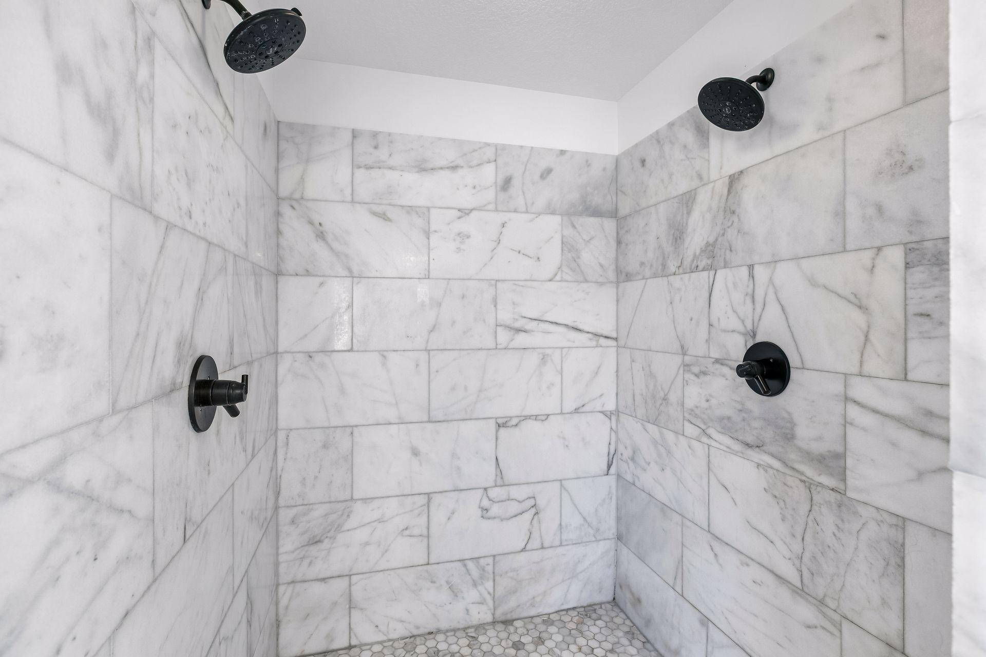 Spacious walk-in shower in the primary bath.