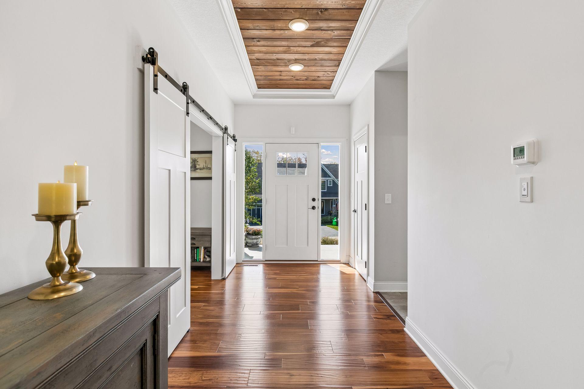 Beautiful entryway filled with natural light and welcoming sunshine.
