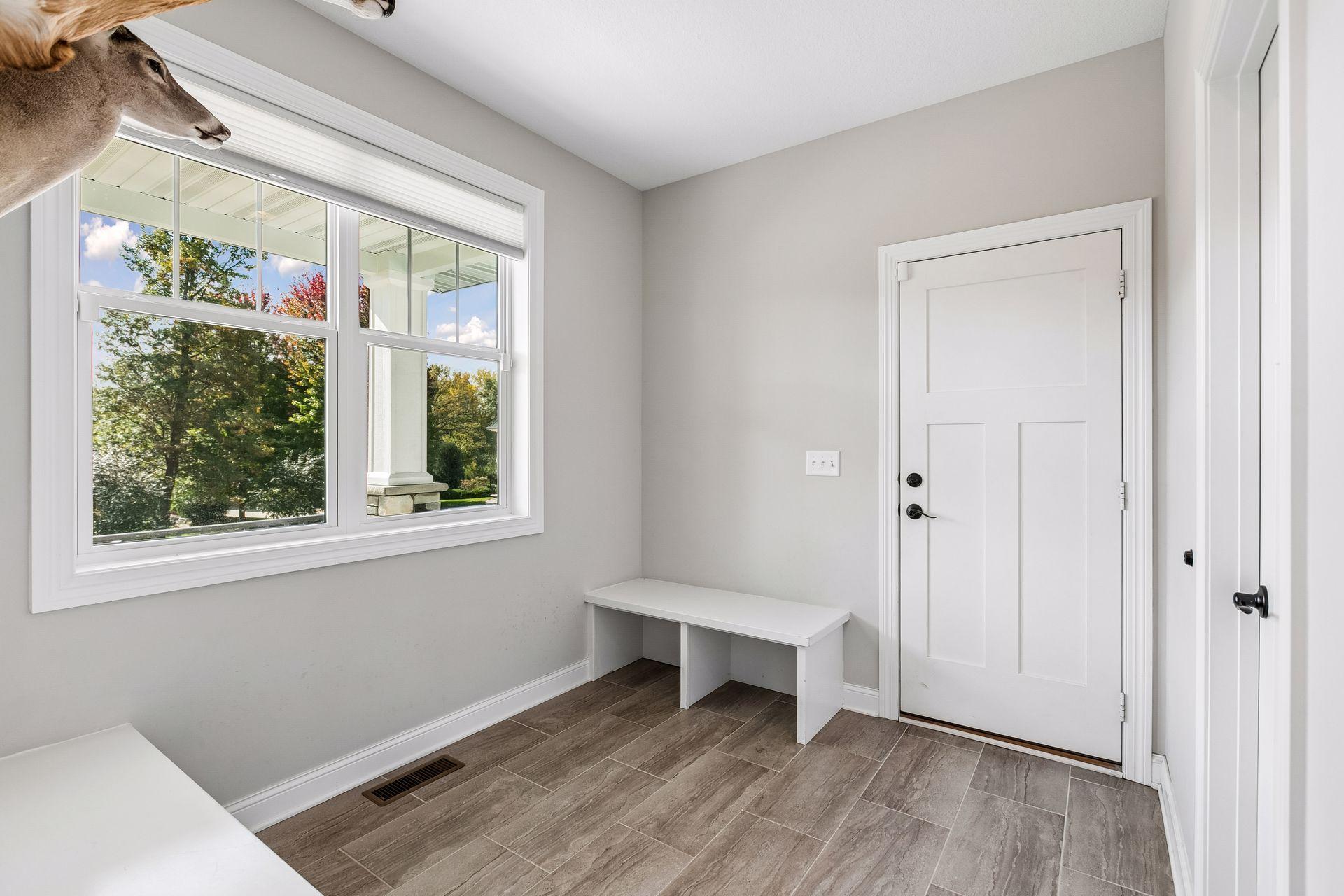 Convenient main-level mudroom helps keep everyday essentials organized.