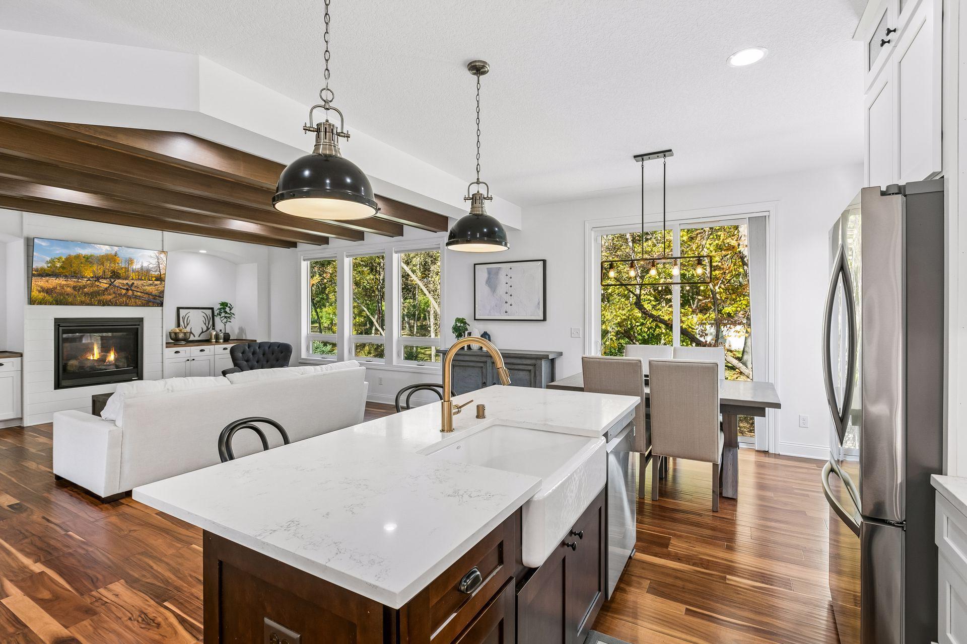 Spacious kitchen island offers a natural gathering spot for entertaining.